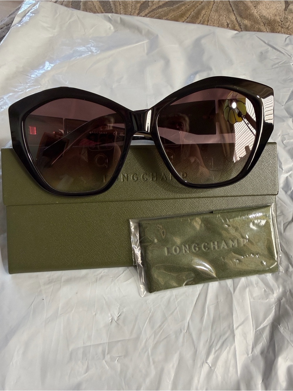 Longchamp Black Frame Sunglasses with Brown Gradient Lenses